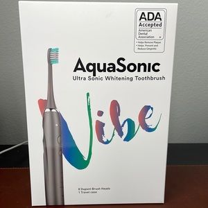 Electronic ultra Sonic whitening toothbrush brand Aquasonic,